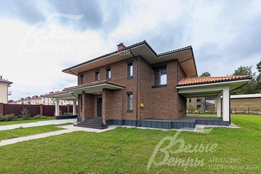 Современный кирпичный коттедж под ключ на участке площадью 25 соток в охраняемом коттеджном поселке Благодать