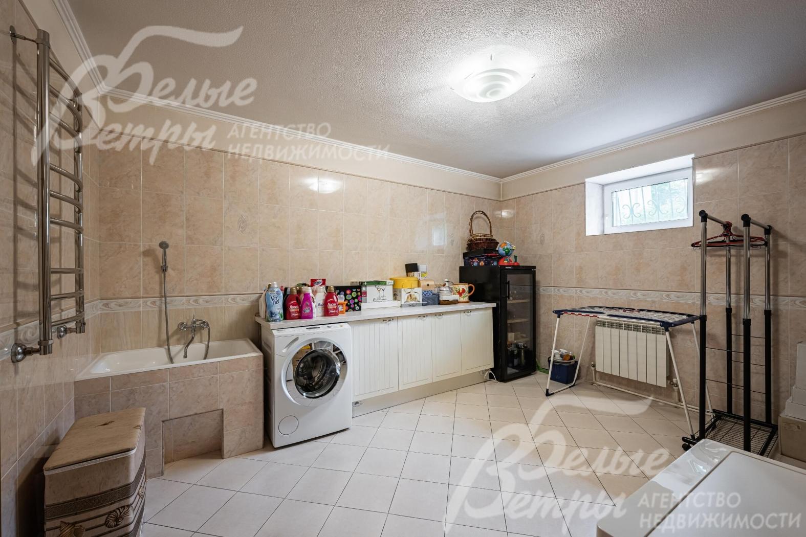 Постирочная на цокольном этаже площадью 15 кв.м