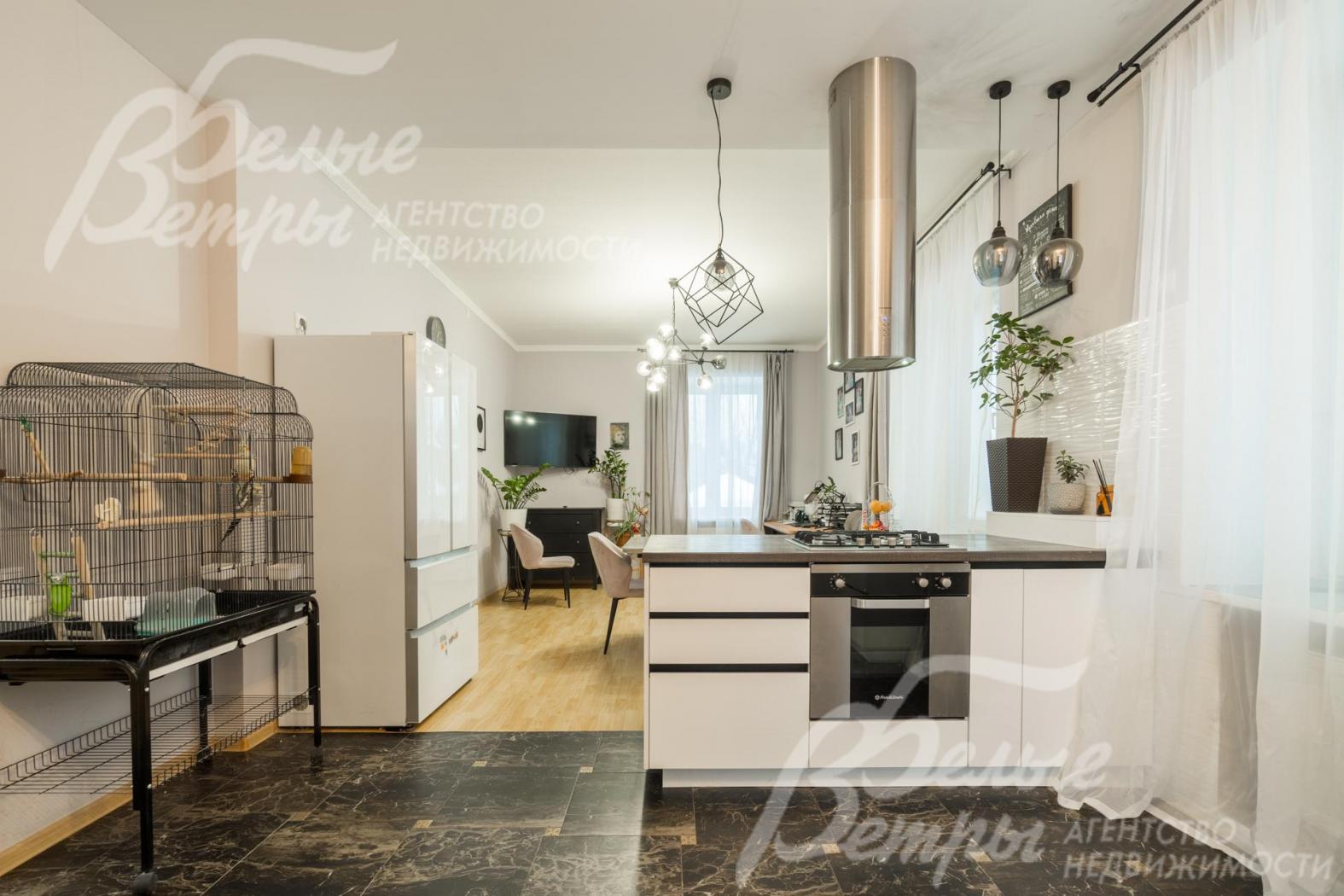 Кухня с островом и встроенной техникой NEFF