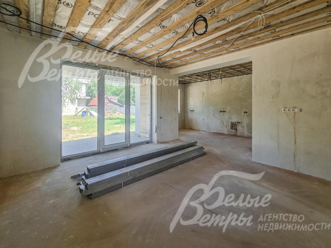 К гостиной примыкает кухонная зона