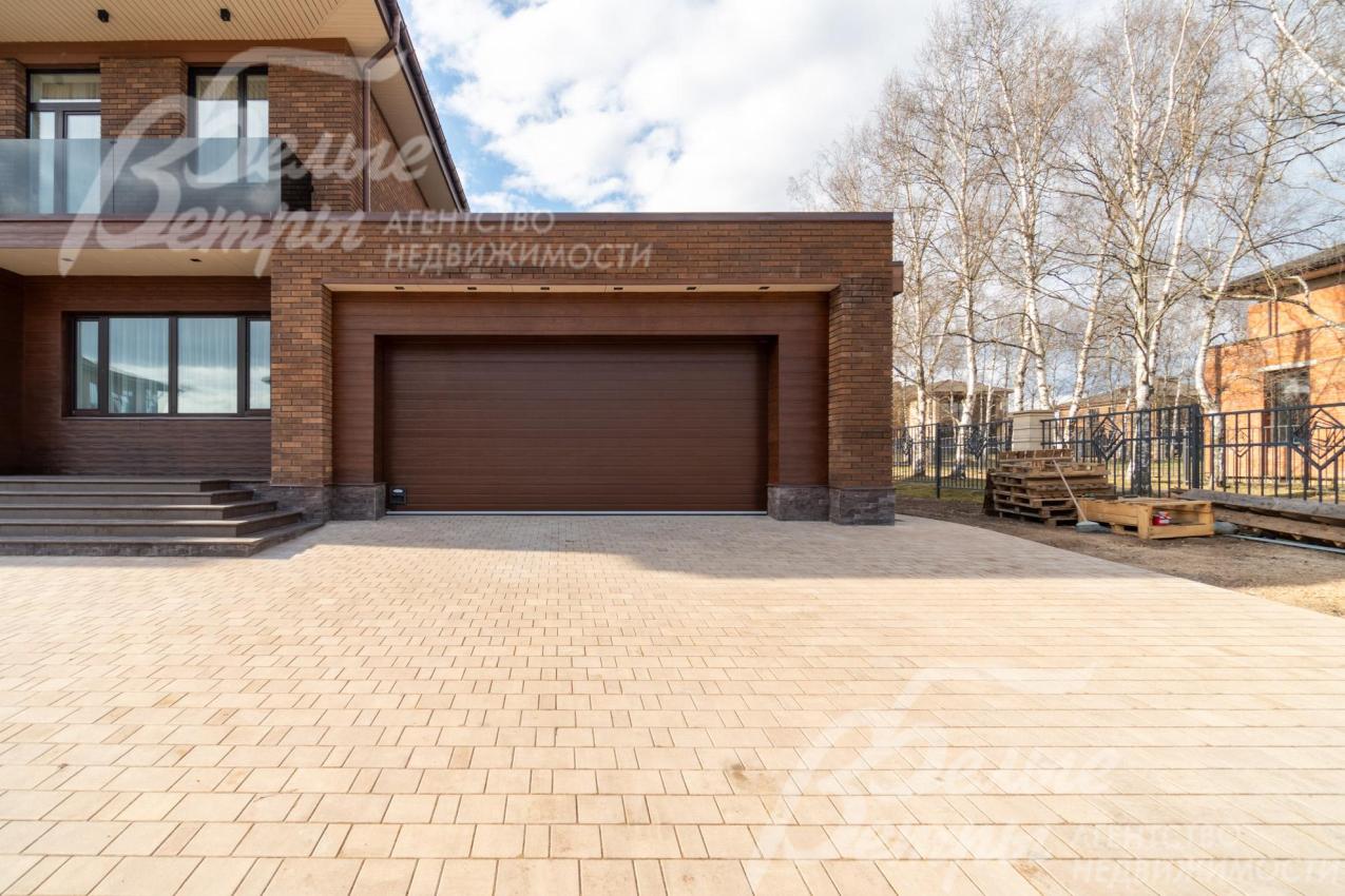 Парковочная площадка перед гаражом