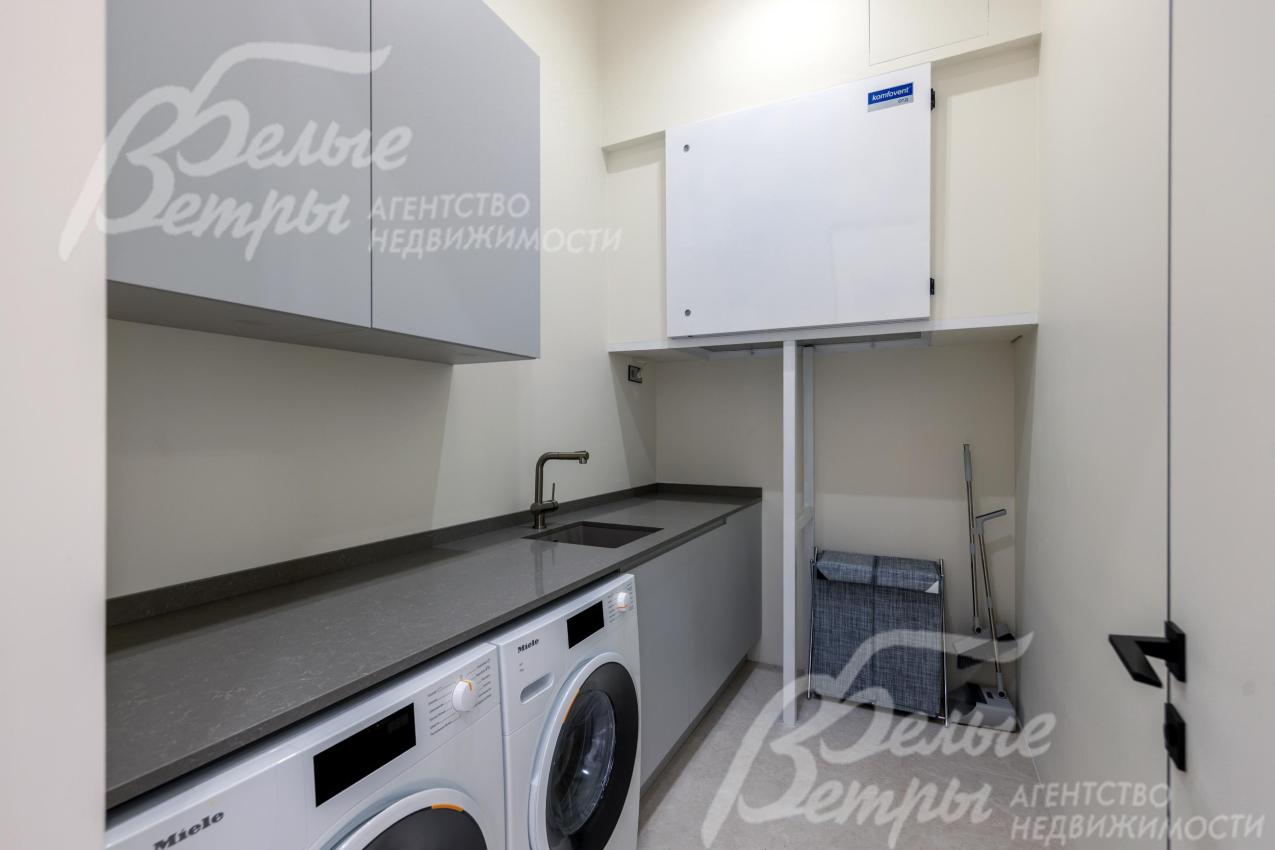 Оборудованная постирочная c техникой Miele