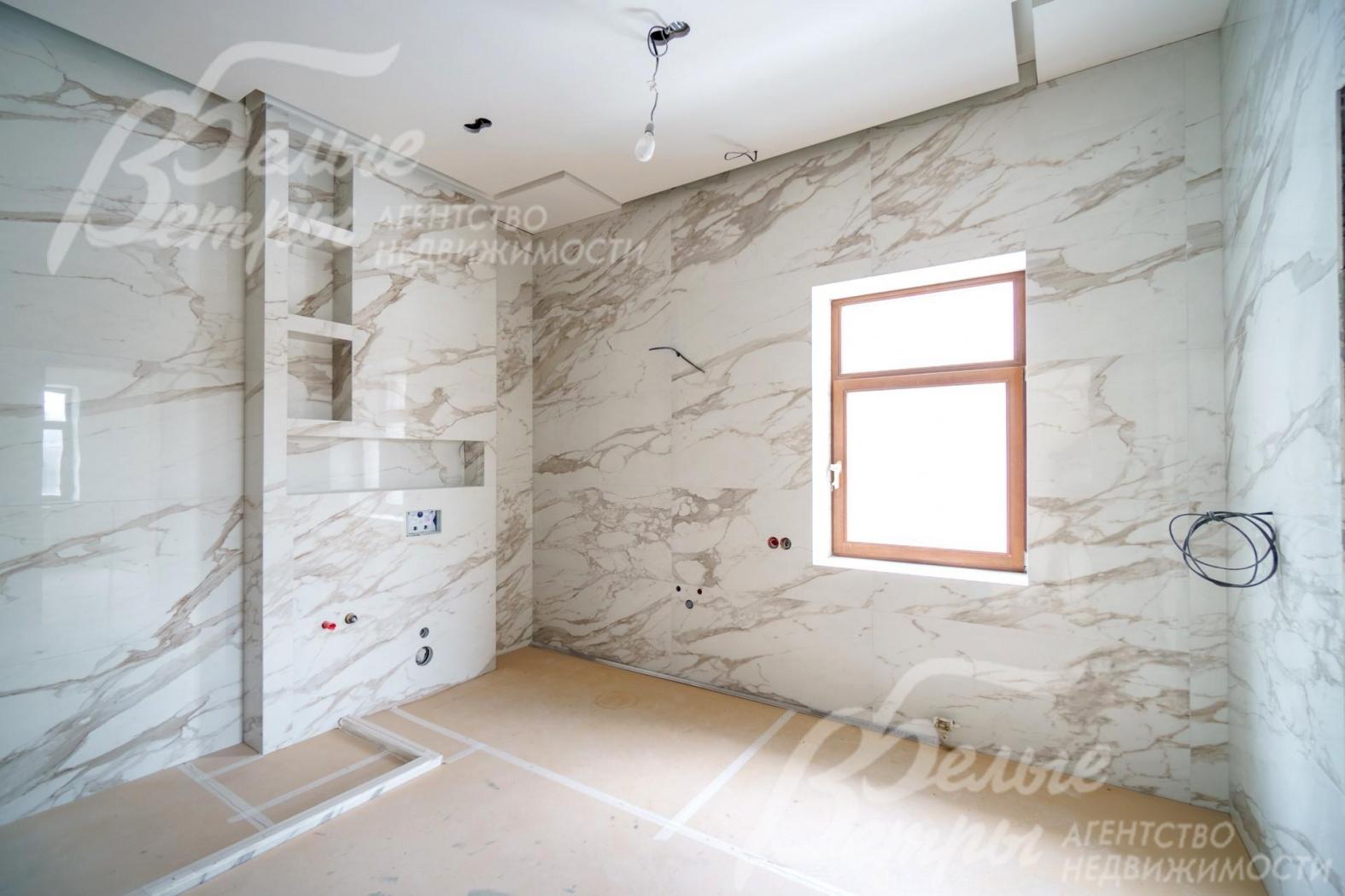 Санузлы отделаны керамогранитом