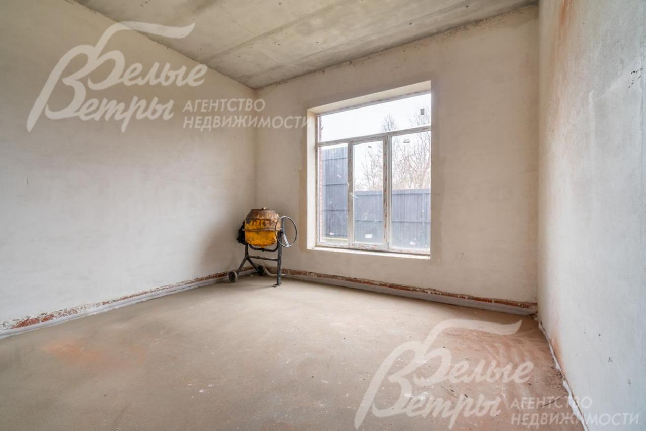 Одна из спален дома расположена на первом этаже