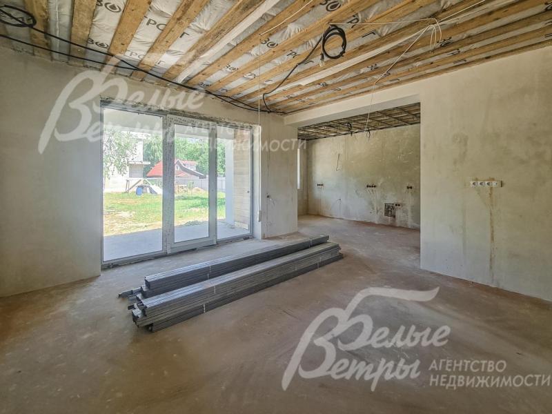 К гостиной примыкает кухонная зона